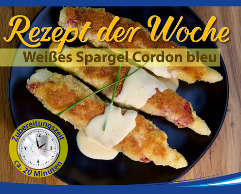 Goldbraun gebratene Spargel-Cordon-Bleus auf einem Teller, mit geschmolzenem Käse und knuspriger Panade. Serviert mit frischem Salat und Sauce Hollandaise.